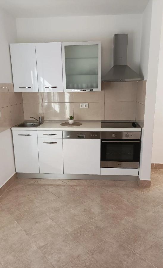 Family Apartments Tomy Punat Esterno foto
